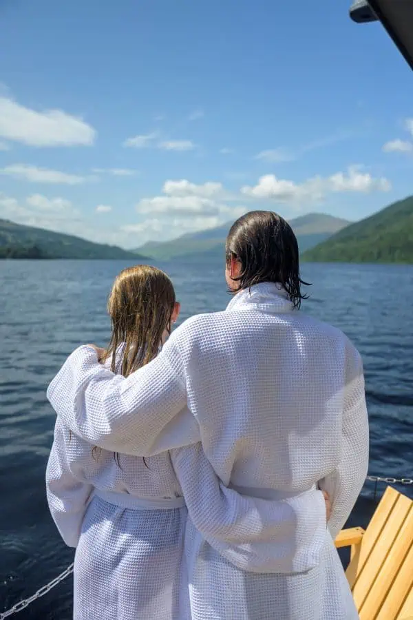 Hot tub boat on the tranquil shores of Loch Tay